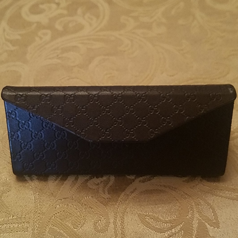 Gucci eyeglass case.
